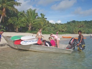 Reef surfing SUP in Fiji