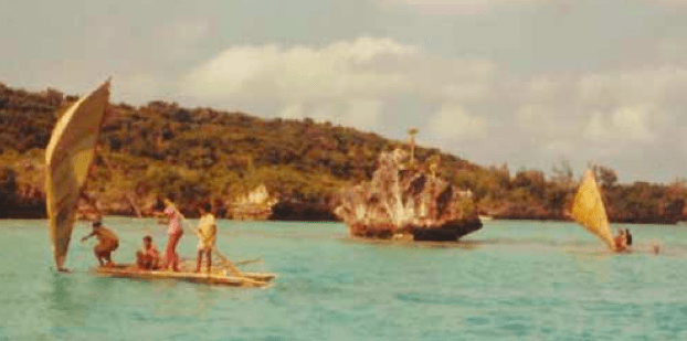 Sailing proa flitting across the lagoon like graceful butterflies, Fulanga.